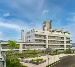 Fachada do empreendimento Edifício Home Cacupé em Cacupé, Florianópolis — pronto para morar na planta