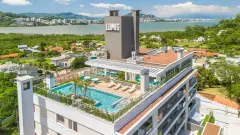 Fachada do empreendimento Edifício Home Cacupé em Cacupé, Florianópolis — pronto para morar na planta